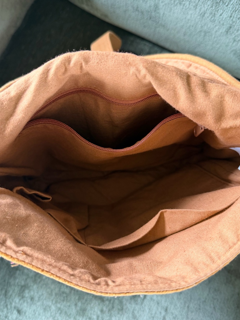 EARTHBOUND Embroidered Suede Crossbody in Tan with Pink Accents - Picture 3 of 3